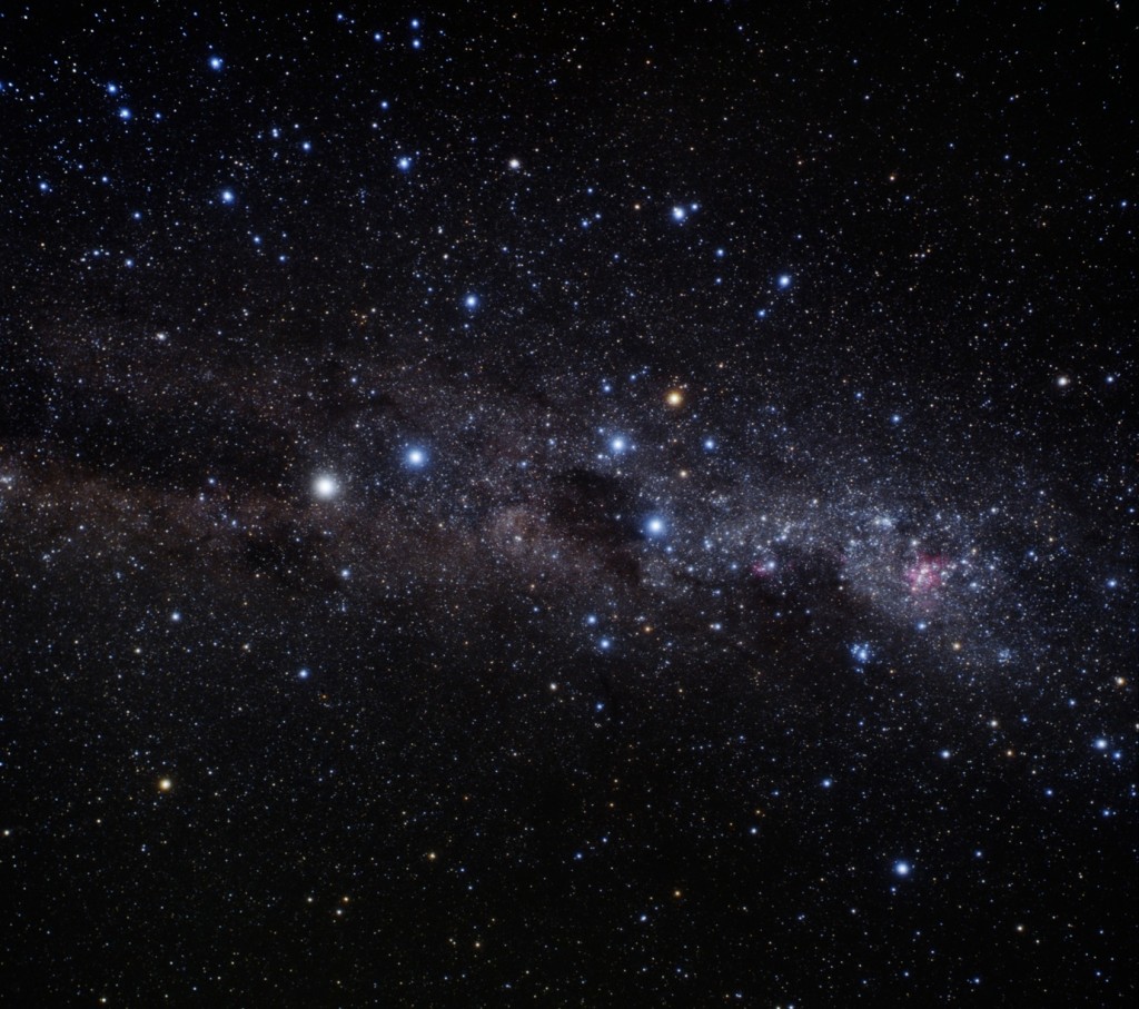 Image of the southern Milky Way showing Crux and the dark Coalsack Nebula, just right of center; the Southern Pointers Rigil Kent and Hadar, left of center, and the eta Carinae Nebula at extreme right. Credit: A. Fuji.