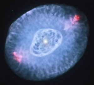 A Hubble Space Telescope image of the Blinking Planetary Nebula NGC 68226 (with additional processing by Judy Schmidt)