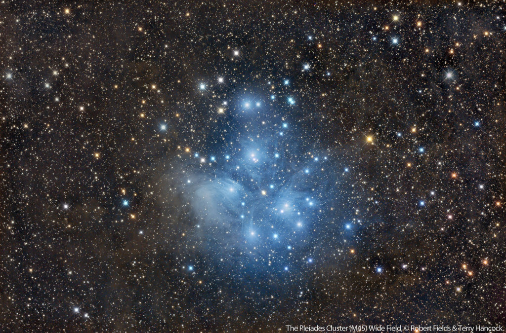 A wide field and detailed image of the Pleiades and its enveloping nebulosity by Terry Hancock and Robert Fields. See image details at this link.