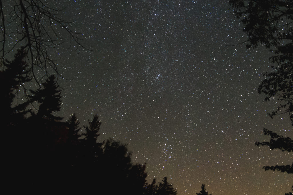 The star Mirfak and its 'Attendants', the cluster known as Melotte 20, are at the bottom of this image, just right of center. Closer to the center of the image, just rightward, lies the famous Double Cluster.
