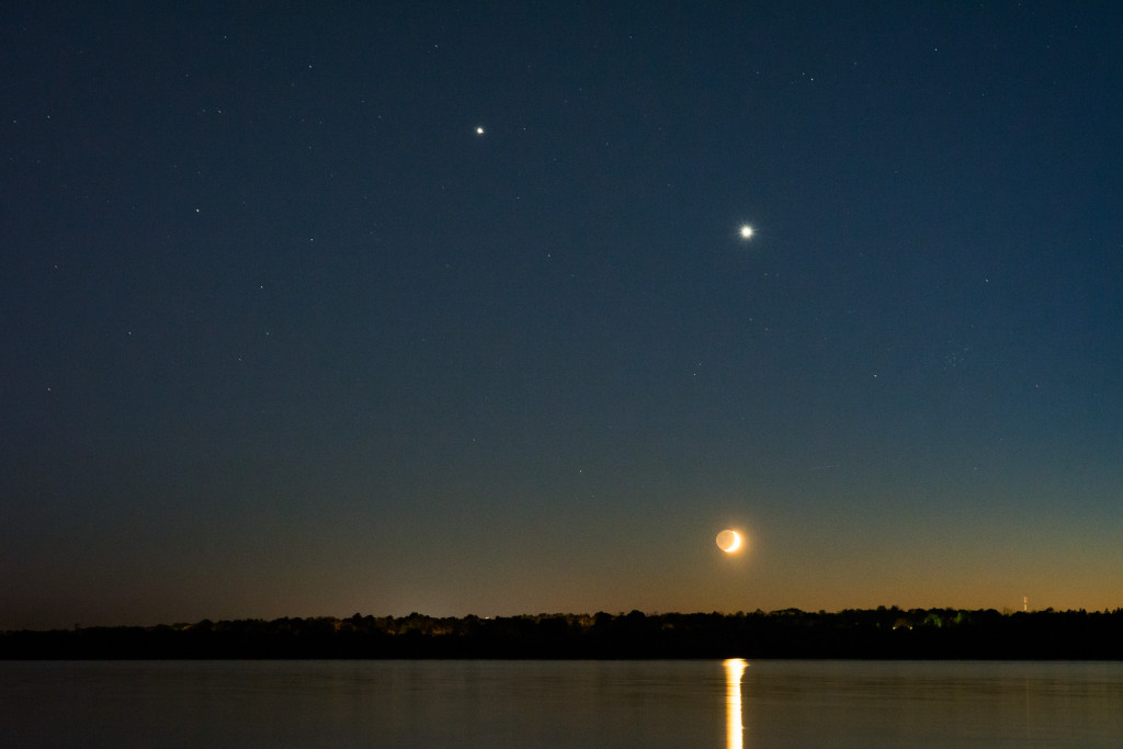 Venus, Jupiter, and the crescent Moon in the western sky after sunset on June 19, 2015. The two bright planets will come within 0.3 degrees of each other on June 30, 2015.