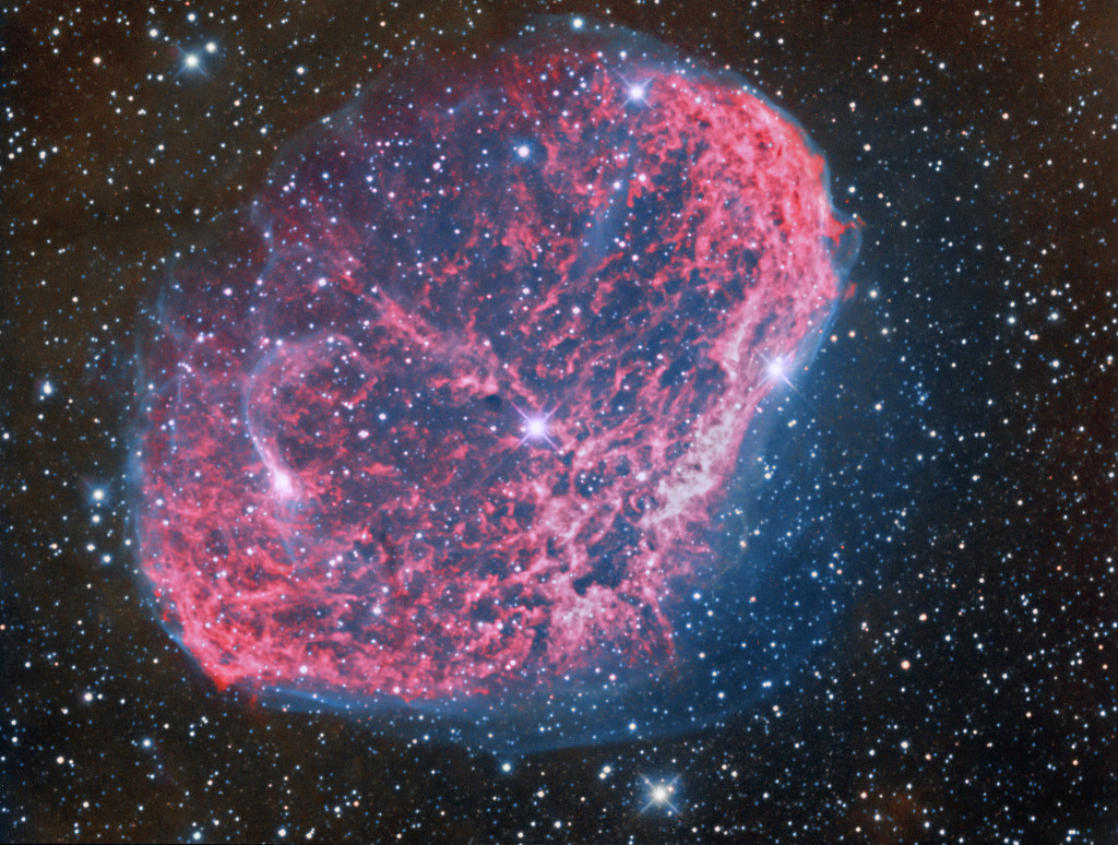 A bi-color image of NGC 6888, the Crescent Nebula, by Terry Hancock. The total integration time for this image was 18 hours.