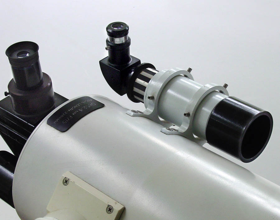 A magnifying finder scope mounted to a telescope.