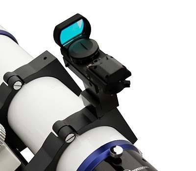 A red-dot finder mounted on a small refractor telescope.